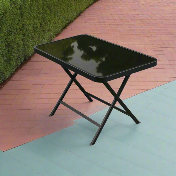 ترابيزة مستطيلة قابلة للطي باللون الأسود مع سطح زجاج فاميه